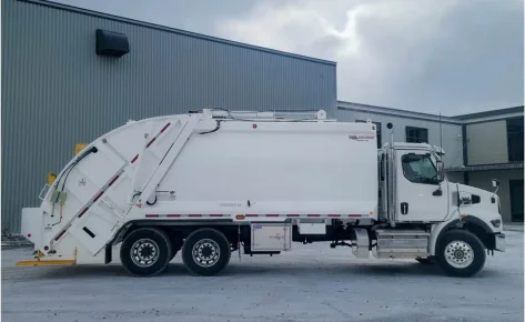 Rear Loader Chagnon Dumpster of 29 cubic yards – delivered